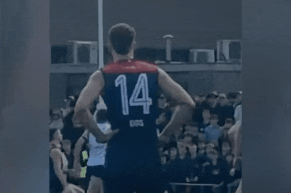 AFL draft hopeful Wil Malady takes a strong mark playing in the APS grand final for Caulfield Grammar. 