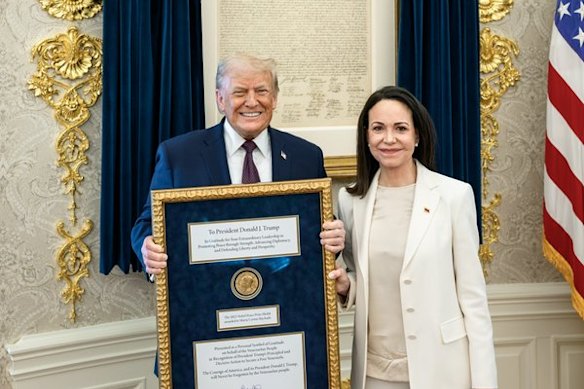 Donald Trump and Maria Machado with the Nobel Peace Prize at the White House on Thursday.