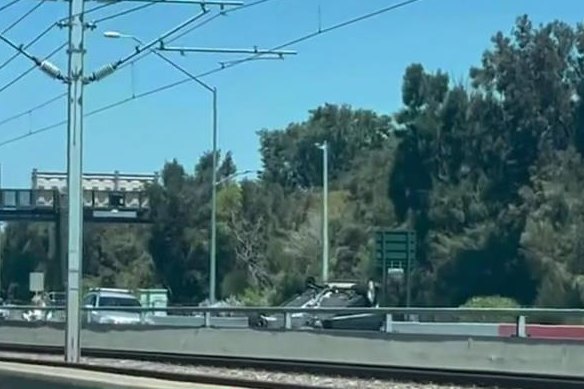 The stolen vehicle on its roof yesterday.