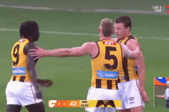 Hawthorn’s Jack Ginnivan and Changkuoth Jiath celebrate.