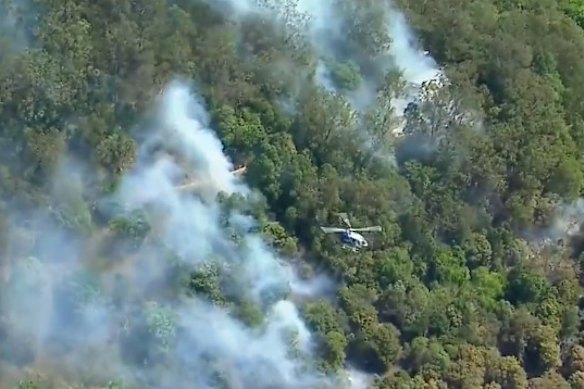 Firefighters are battling the blaze from the sky and land.