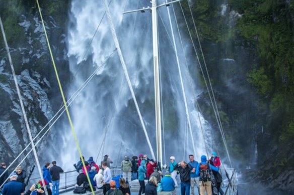 Something closer to come: A tour group in Milford Sound, New Zealand.