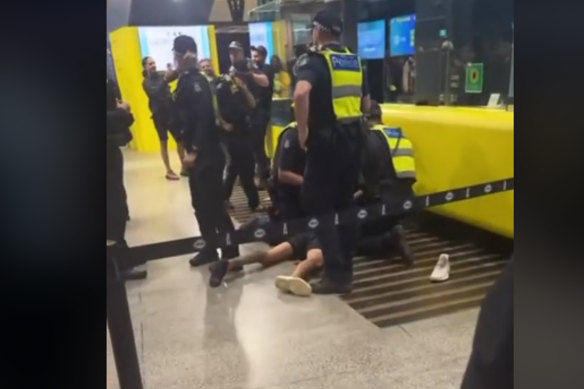 Police arrested two men for carrying guns into the MCG on April 3.