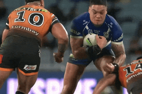 Latu Fainu’s tackle on Leo Thompson.