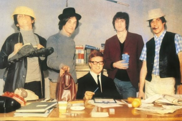 Larry Page (centre) connected  an medium  screen  for The Kinks.