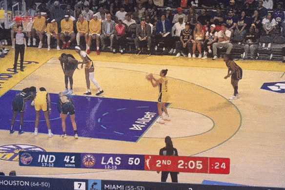 Sex toy thrown on to the court disrupts WNBA match between LA Sparks and Indiana Fever.