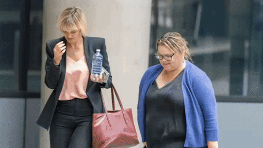 Former Coles manager Rebecca Thompson leaves the Federal Court in Melbourne on Wednesday.