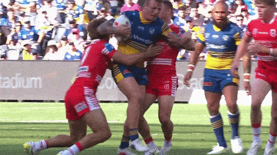 J’maine Hopgood is tackled by Ryan Couchman.