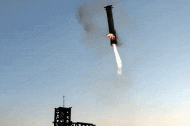SpaceX’s mega rocket booster returns to the launch pad to be captured during a test flight in Boca Chica, Texas, on Sunday (Monday AEDT)