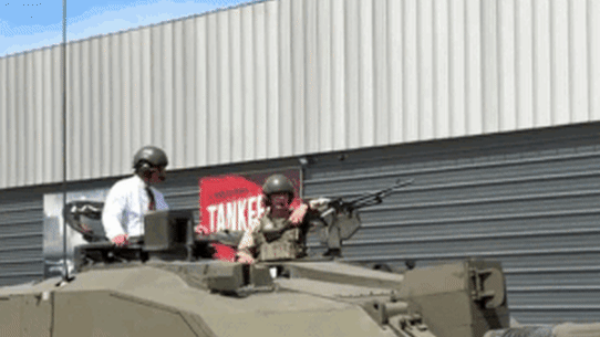King Charles III rides in a Challenger 2 Main Battle Tank HP GIF
