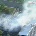 Police continue to investigate a deadly house fire in Logan, Queensland, that killed two people.