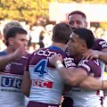 Tolu Koula charges over in the corner to get Manly on the scoreboard against the Sharks.