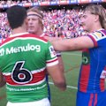 Cody Walker exchanges words with Phoenix Crossland as both sides shake hands.