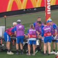 The crowd cheers Aaron Naughton off on the stretcher in Marvel Stadium as the Western Bulldogs injury list adds another name.