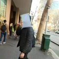A junior doctor who secretly filmed staff in Melbourne hospital toilets has pleaded guilty to 13 charges.