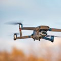 ASIO is being urged to investigate how 147 unidentified drones flew over Australian air bases.