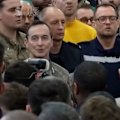 Emmanuel Macron joins crew aboard aircraft carrier Charles de Gaulle to sing La Marseillaise after the French Navy was deployed to the Middle East.