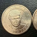Coins featuring US President Donald Trump's face are now in circulation in America, according to US officials