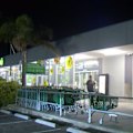 Three men have been arrested after a teenager was allegedly stabbed with a machete inside a Melbourne supermarket.