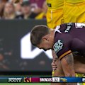 Reece Walsh gives Brisbane's fans a fright as he clutches at his knee.