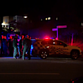Police are hunting an armed offender who allegedly stabbed a man on the Gold Coast.