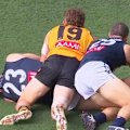 Carlton star Jacob Weitering is down and hurt.
