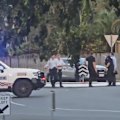 An innocent bystander was one of two people shot by police in Cairns as officers responded to reports of an armed man.