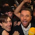 Arsenal fans celebrate a drought-breaking title after Manchester City were held to a draw.