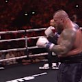 Tommy Fury and Eddie Hall trade punches in a bizarre heavyweight boxing fight.