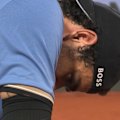 An emotional Matteo Berrettini retired injured against countryman Matteo Arnaldi in the quarter-finals at Roland Garros.
