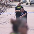 A female pedestrian is fighting for life after she was struck by a car while crossing at a green light in Melbourne’s west.
