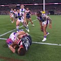 Mark Nawaqanitawase drops the ball cold in the corner after being tackled by Newcastle's Kalyn Ponga.