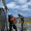 WA Police TRG officers arrested two climate activists who attached themselves to a Woodside gas platform off the WA coast.