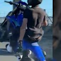 Exclusive footage shows trail bike riders doing wheelies and riding recklessly on the Harbour Bridge on Sunday.
