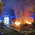 Police fired tear gas at protesters in central Paris during a series of confrontations as the authorities sought to arrest suspects and disperse large crowds.