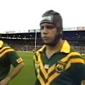 Old vision before a Kangaroos game shows players including Laurie Daley not singing the national anthem.