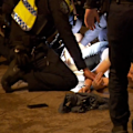 Three officers jumped into the River Torrens in Adelaide to save a fleeing brawl suspect who couldn't swim.