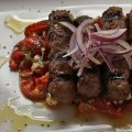 A dish of spicy cevapcici.