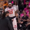 A fan invades the court in the NBA Finals and attempts to take a selfie with Victor Wembanyama.