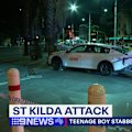 A manhunt is underway in Melbourne after a teenage boy was stabbed before being struck by a car.