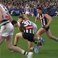Collingwood captain Darcy Moore cops a bump to the head and is ruled out with concussion.
