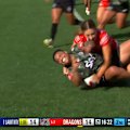 Warriors centre Mele Hufanga crashes over in the second half against the Dragons.