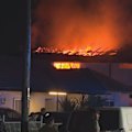 A family of eight has managed to escape after a fire caused the roof of their home to collapse in Sydney's west.