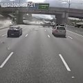Dash cam video has emerged showing a white Nissan veering into an SUV, sending it rolling on the M1 south of Brisbane on Friday.