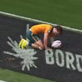 Ben Dowling's double fires the Aussies past Spain at the Bordeaux Sevens.