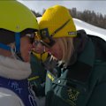 Danielle Scott cries through congratulations from family and members of the Australian team.