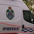A Brisbane resident has described the discovery of a body in an apartment complex bin as “pretty disturbing”.
