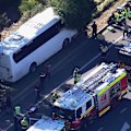 A school bus carrying more than 40 teenage students has crashed in Sydney's west, leaving the driver in a critical condition and several students injured.