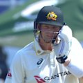 Steve Smith is forced into a helmet change after a nasty bouncer.