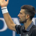 Novak Djokovic urges the crowd to get behind him after grabbing the momentum in the third set with a crucial break.